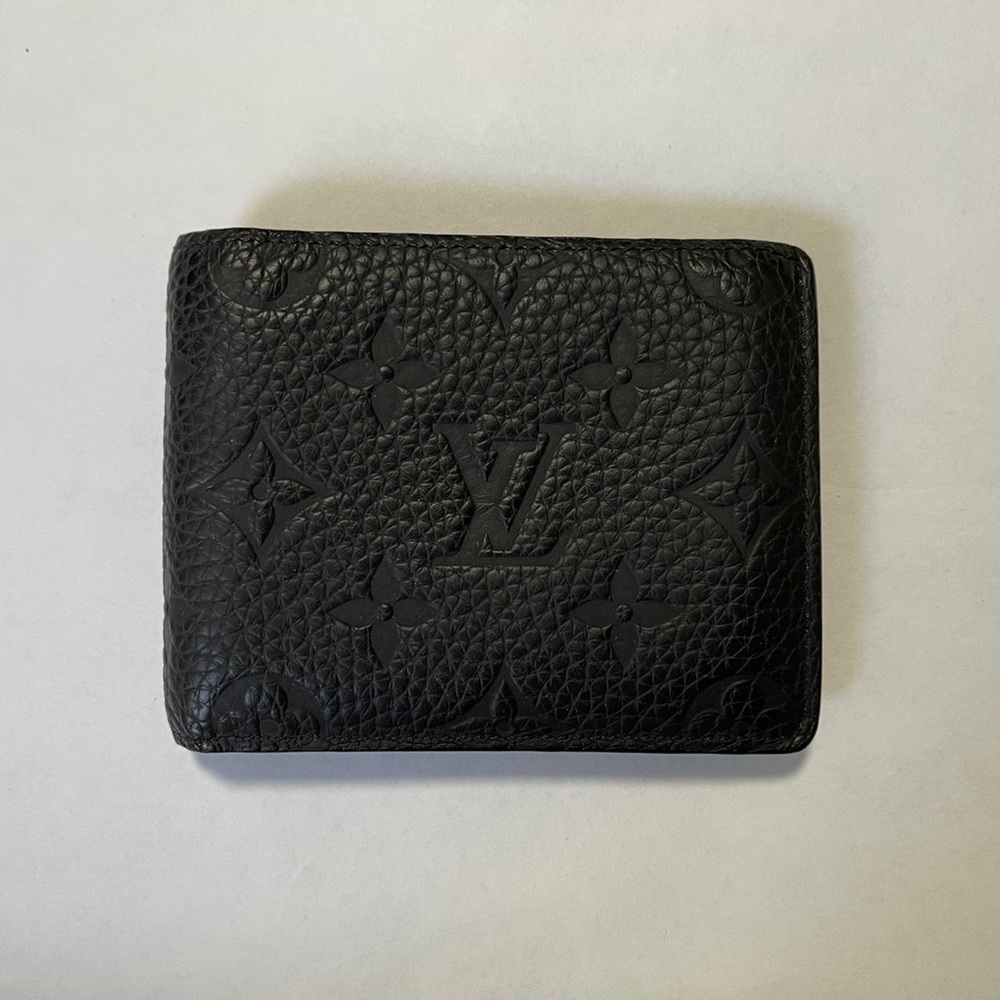 Louis Vuitton Slender Wallet Black Taurillon leather embossed 8 credit card slot